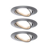 Three round recessed spotlights in brushed silver aluminum with warm white light