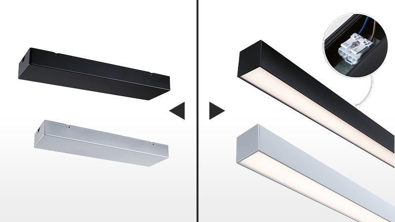 Sorte og sølvfarvede PowerChannel LED-lys med tilslutningsdetalje til moderne indendørs belysning.