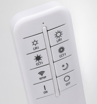 White LED remote control with buttons for brightness, color temperature, setup, on and off functions
