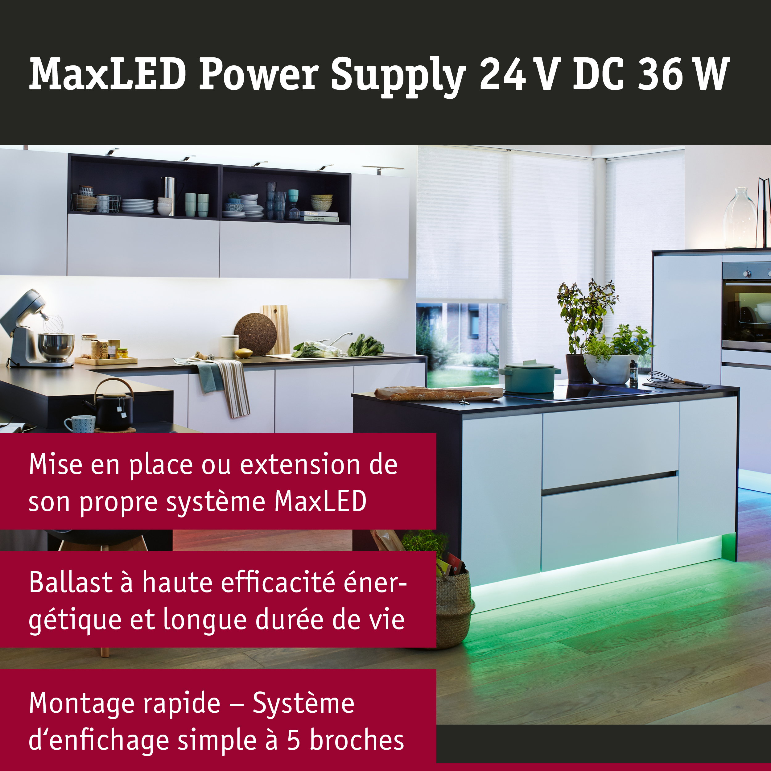 Cuisine blanche moderne avec éclairage LED vert sous les meubles et îlot avec four et plantes