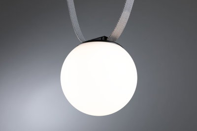 Round white LED pendant light with matte glass and grey textile cable for modern interiors