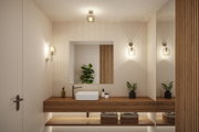 Salle de bain moderne avec meuble en bois, vasque blanche et appliques murales en verre blanc chaud.
