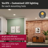 Living room with warm white LED ceiling lights providing bright, large-area illumination and cozy atmosphere