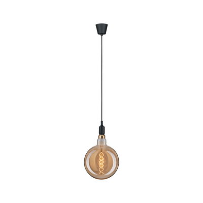 Hanging light bulb with black cable and amber glass for decorative lighting in interiors