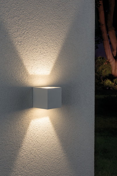 Modern white aluminum wall light with warm white light for outdoor and garden lighting applications