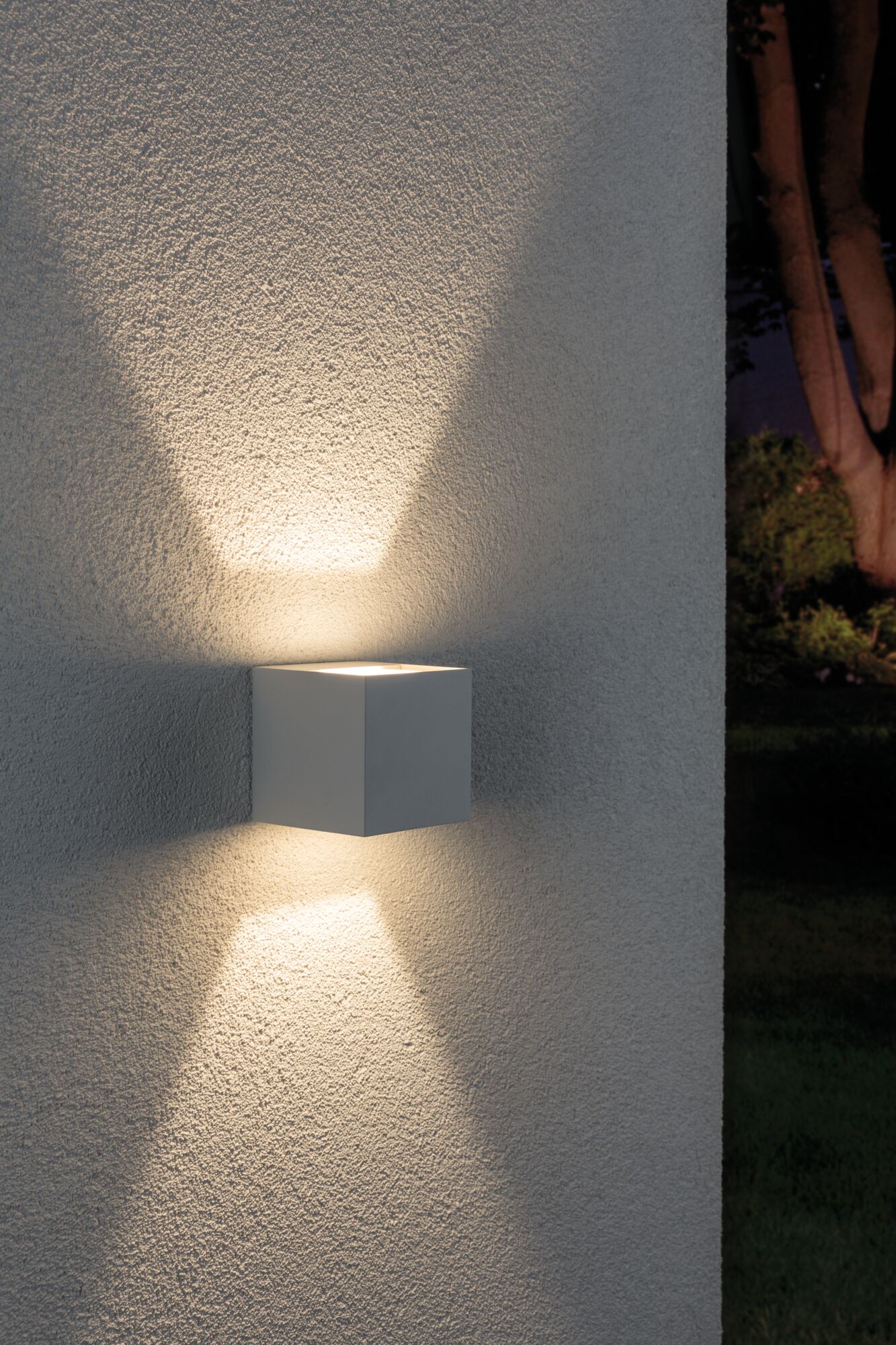 Modern white aluminum wall light with warm white light for outdoor and garden lighting applications