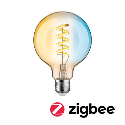 Light bulb with spiral filament in glass emitting warm and cool white light for Zigbee smart lighting