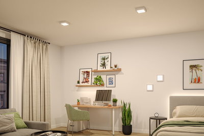Modern living room with square white LED ceiling and wall lights, minimalist home office and bedroom setup