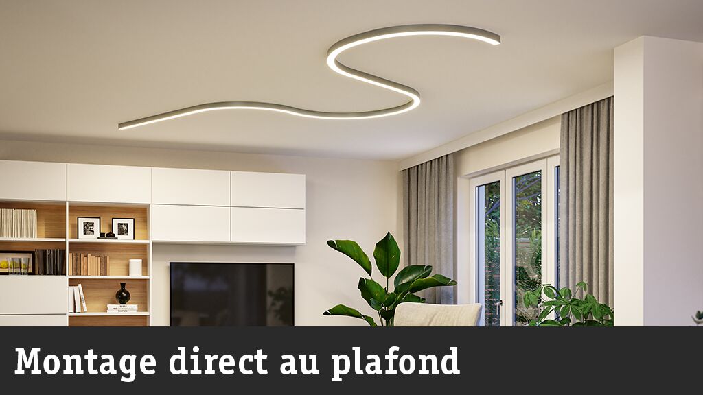 Salon moderne avec éclairage LED au plafond blanc incurvé pour une ambiance élégante