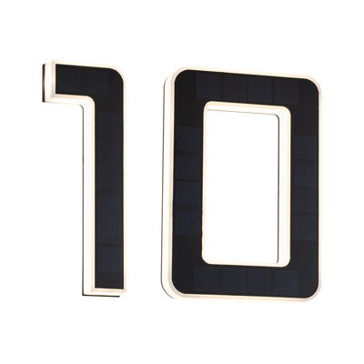 Modern house number 10 with black solar panels and white LED lighting for outdoor use