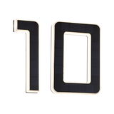 Modern house number 10 with black solar panels and white LED lighting for outdoor use