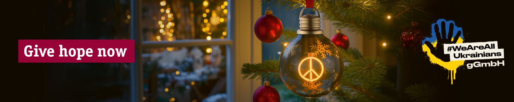 Glass Christmas globe with glowing peace sign and red baubles on tree in warm window light