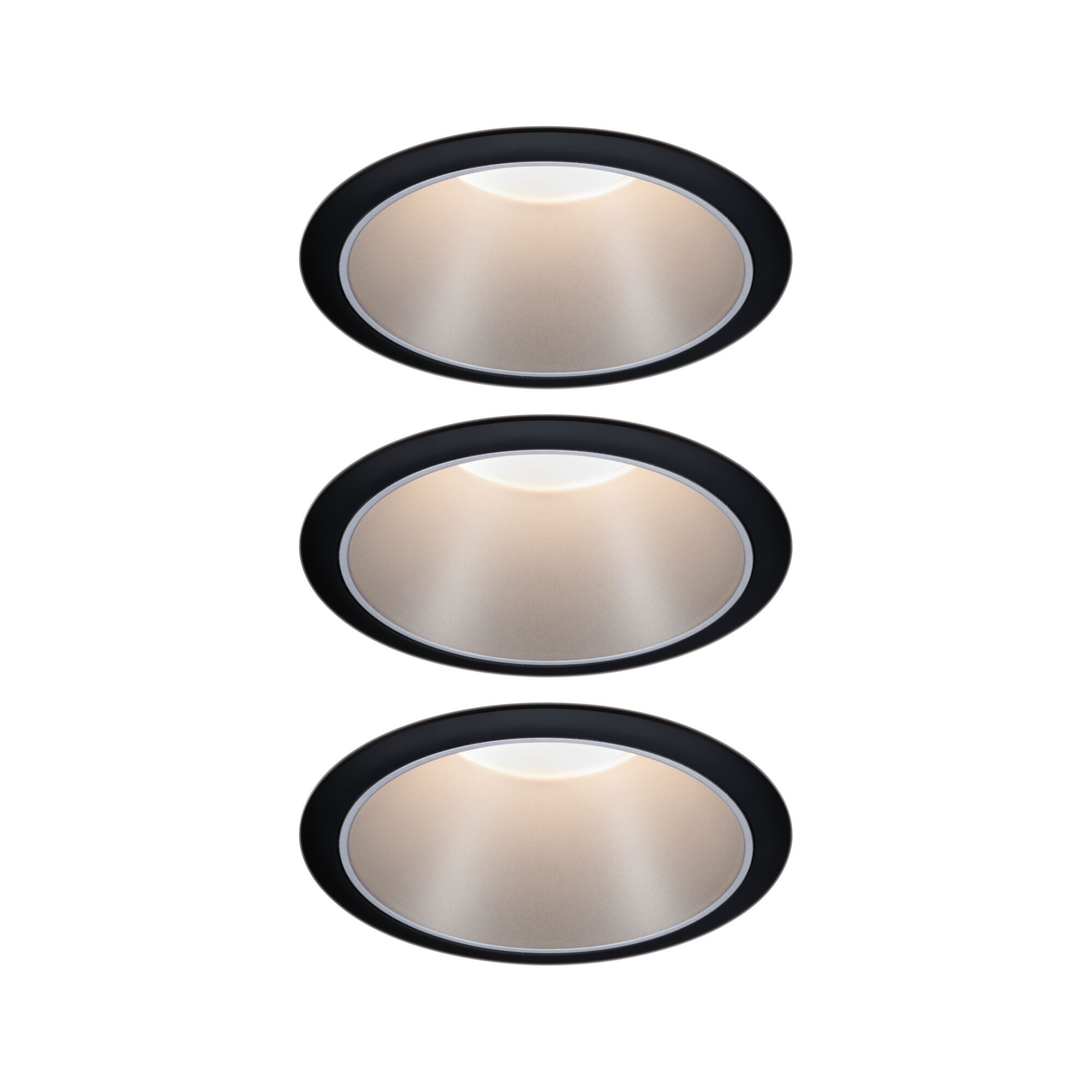 Trois spots encastrés ronds avec cadre noir et lumière blanc chaud pour éclairage intérieur moderne