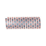 Bande LED flexible avec lumières rouges sur support blanc pour éclairage décoratif.