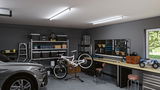Moderne garage met grijze auto, witte fiets op standaard en LED-plafondlampen voor werkplaatsverlichting