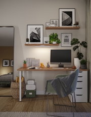 Modernes Home-Office mit Holzschreibtisch, grünem Stuhl und LED-Wandleuchte für angenehmes Licht.