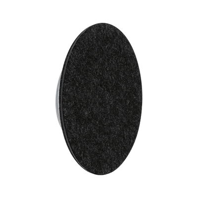 Round black felt furniture pad with plastic base to protect floors and reduce noise when moving furniture