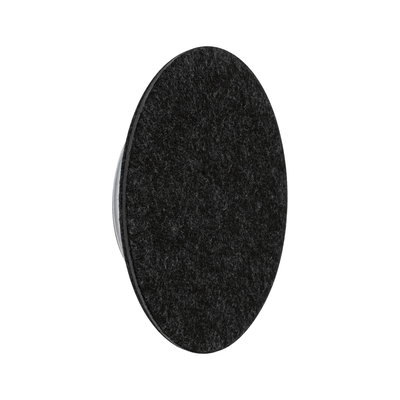 Round black felt furniture pad with plastic base to protect floors and reduce noise when moving furniture