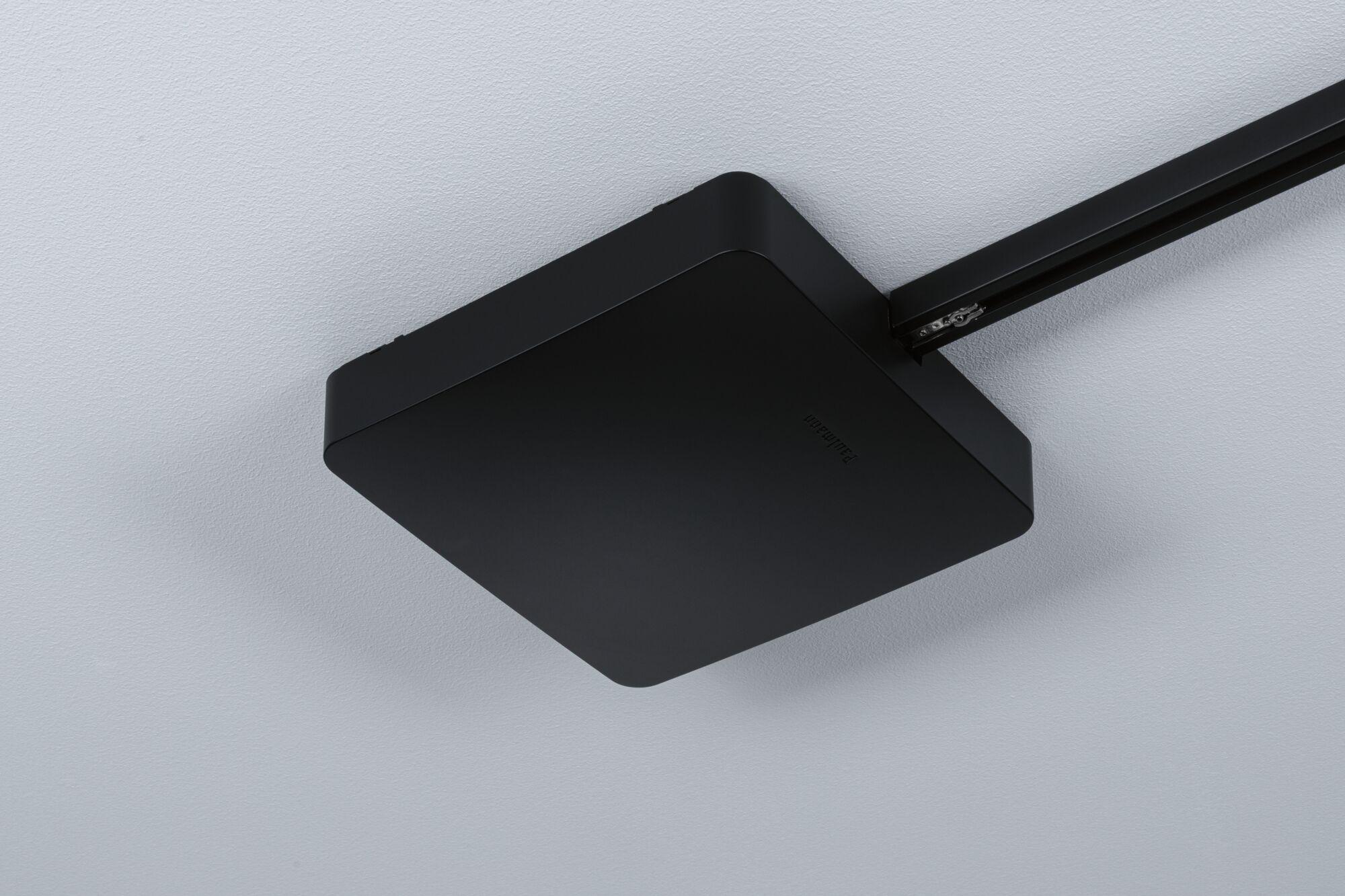 Black square metal ceiling panel with slim track system for modern lighting solutions
