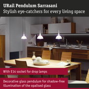 Modern pendant lamps with opal glass and E14 socket above wooden table in stylish kitchen