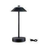 Black table lamp with leather cover and white stitching, including USB charging cable for modern lighting.