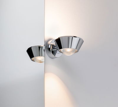 Modern wall spotlight in chrome metal with warm white light for stylish room lighting