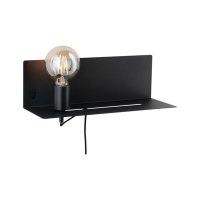 Black metal wall lamp with visible bulb and shelf for modern interior lighting and decor