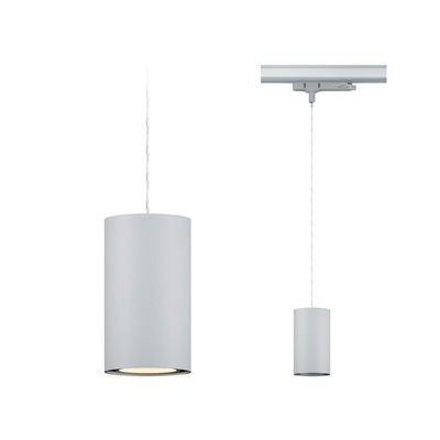 Two white cylindrical metal pendant lights hanging from transparent cables on track system.