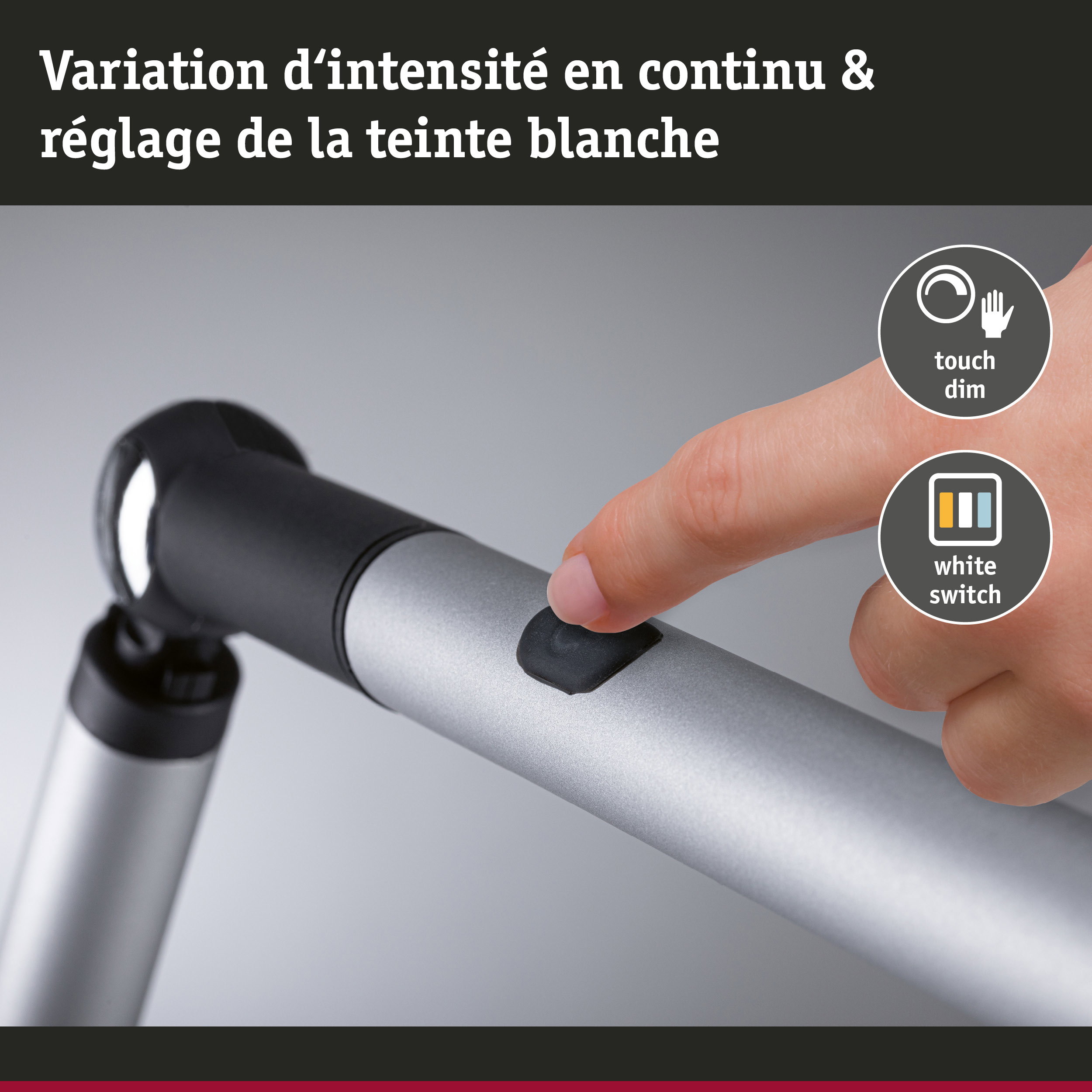 Main utilisant un variateur tactile en aluminium noir et argent pour réglage continu de la lumière