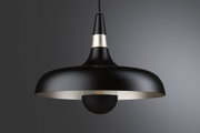 Black metal pendant lamp with silver accent and visible LED bulb for modern interior lighting