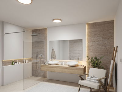 Modernes Badezimmer mit Holz-Waschtisch, zwei weißen Aufsatzbecken und indirekter LED-Beleuchtung.