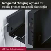 Black wall mount with integrated USB Type-C charging socket for mobile phones and small electronics.