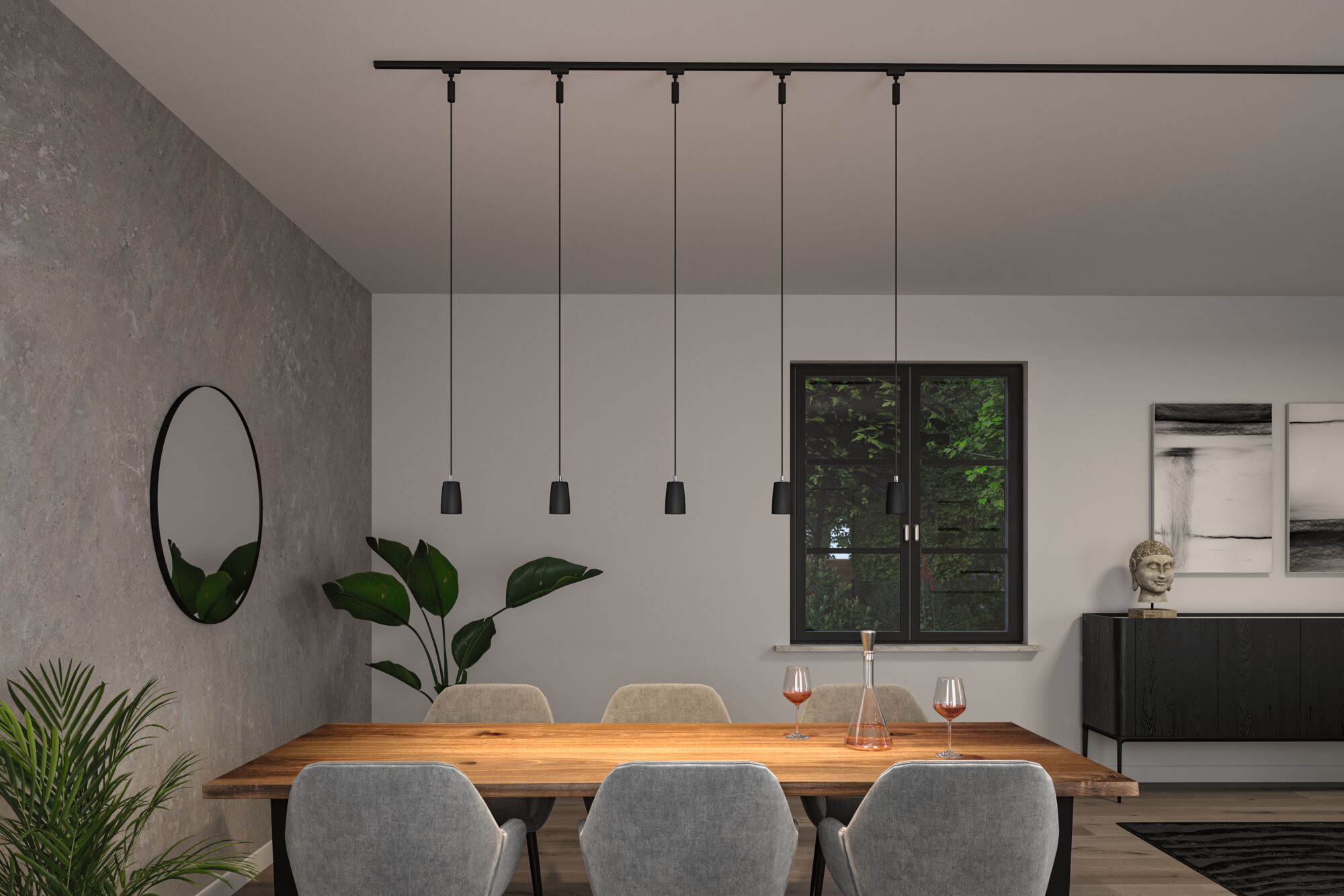Salle à manger moderne avec suspension sur rail noire et six abat-jours métalliques noirs.