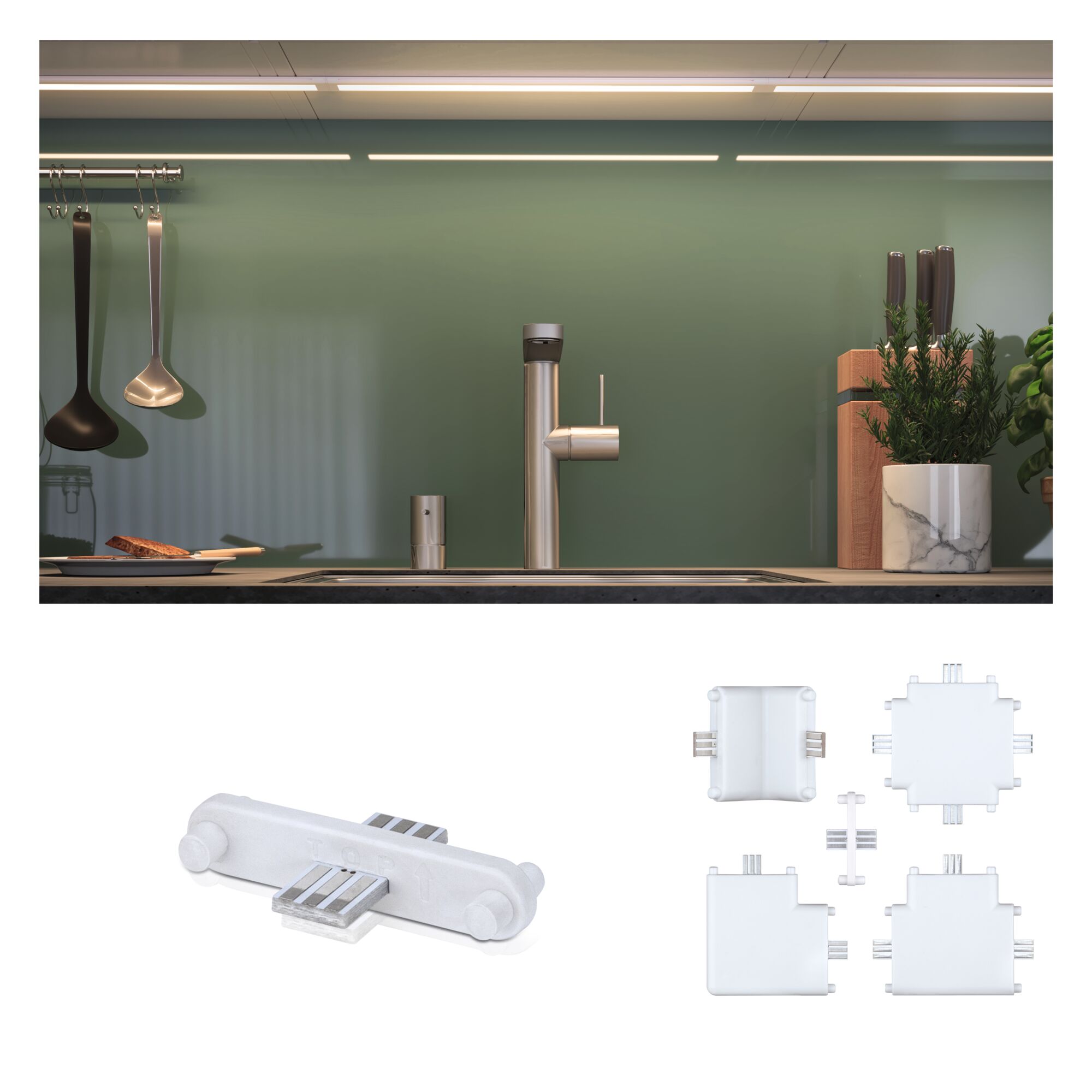 Keukenwerkplek met roestvrijstalen kraan en groene glazen achterwand, witte kunststof LED-connectoren.