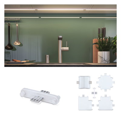 Plan de travail de cuisine avec robinet en acier inoxydable et crédence en verre vert, connecteurs LED en plastique blanc.