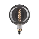 Large LED bulb with spiral filament and smoked glass for decorative lighting and modern interior design