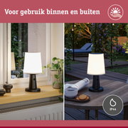 Zwarte tafellamp met witte kunststof kap, geschikt voor binnen- en buitengebruik met IP44 bescherming