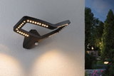 Black LED outdoor wall light with motion sensor and warm white light for garden and terrace.