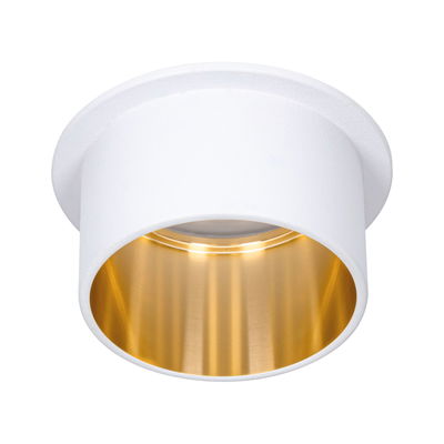 Round recessed ceiling spotlight in white metal with gold interior ring for modern LED lighting