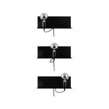 Three black metal wall lamps with clear bulbs for modern indoor lighting solutions.