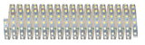 Flexible LED strip with warm white LEDs on silver circuit board for decorative lighting use