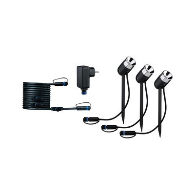 Ensemble de projecteurs LED de jardin noirs avec trois lampes, câble et adaptateur pour éclairage extérieur.
