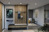 Modern hallway with wooden panel, bench, and LED ceiling lights for stylish home lighting.