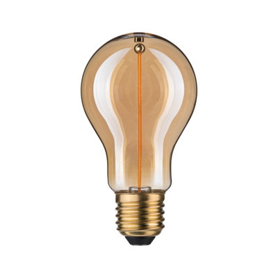 Vintage light bulb with amber glass and gold base for decorative lighting and retro style
