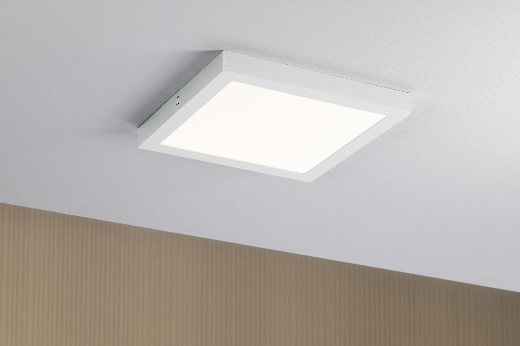 Square white metal LED ceiling light with warm white illumination for modern interiors