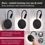 Zwarte Miora accu-wandlamp met flexibele leesarm en touchdimmer voor direct en indirect licht