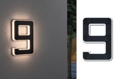 Schwarze Solarhausnummer 9 mit weißer LED-Beleuchtung an Außenwand für Hausnummernbeleuchtung