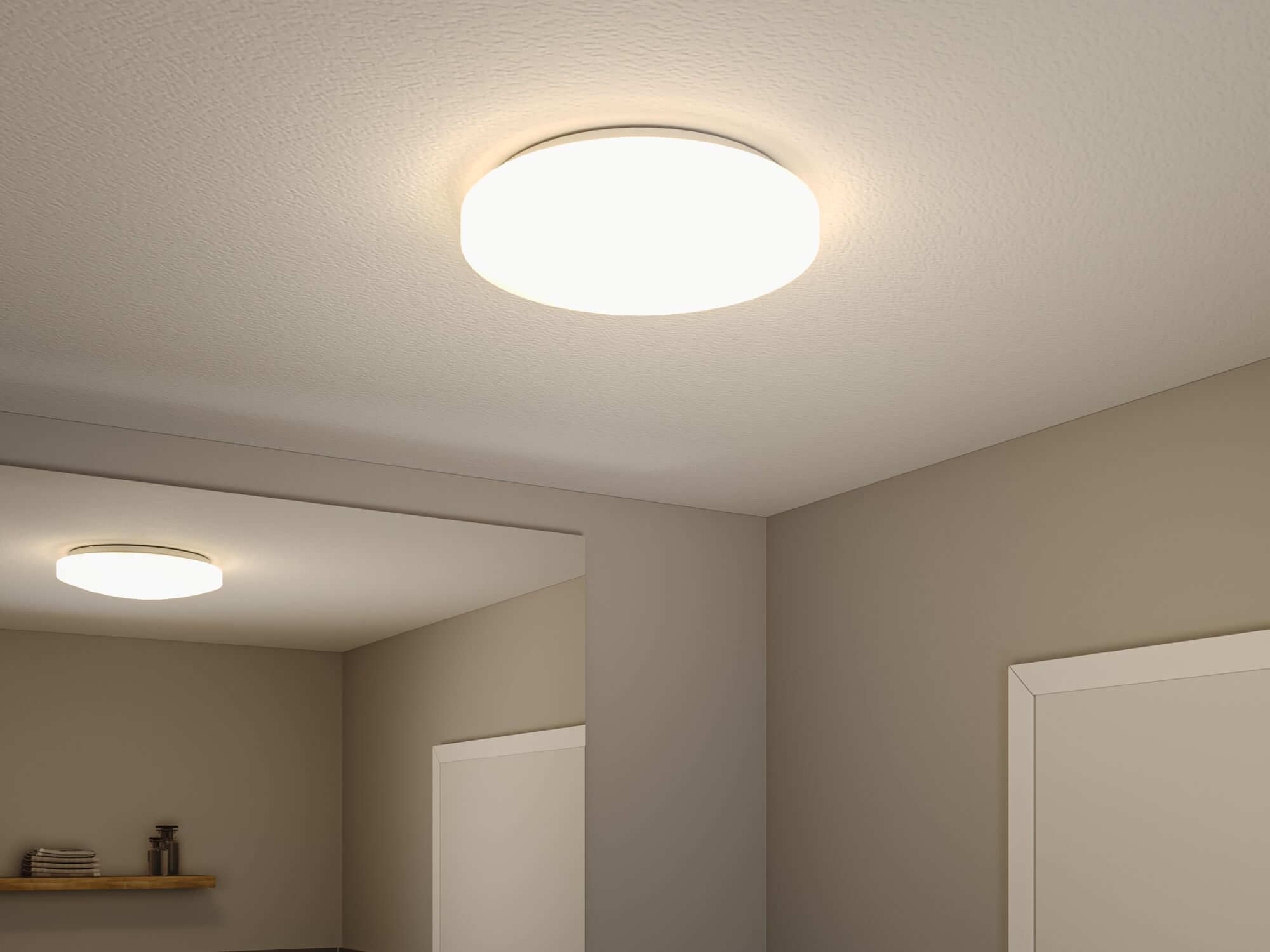 Round white plastic ceiling light with warm white illumination for home lighting