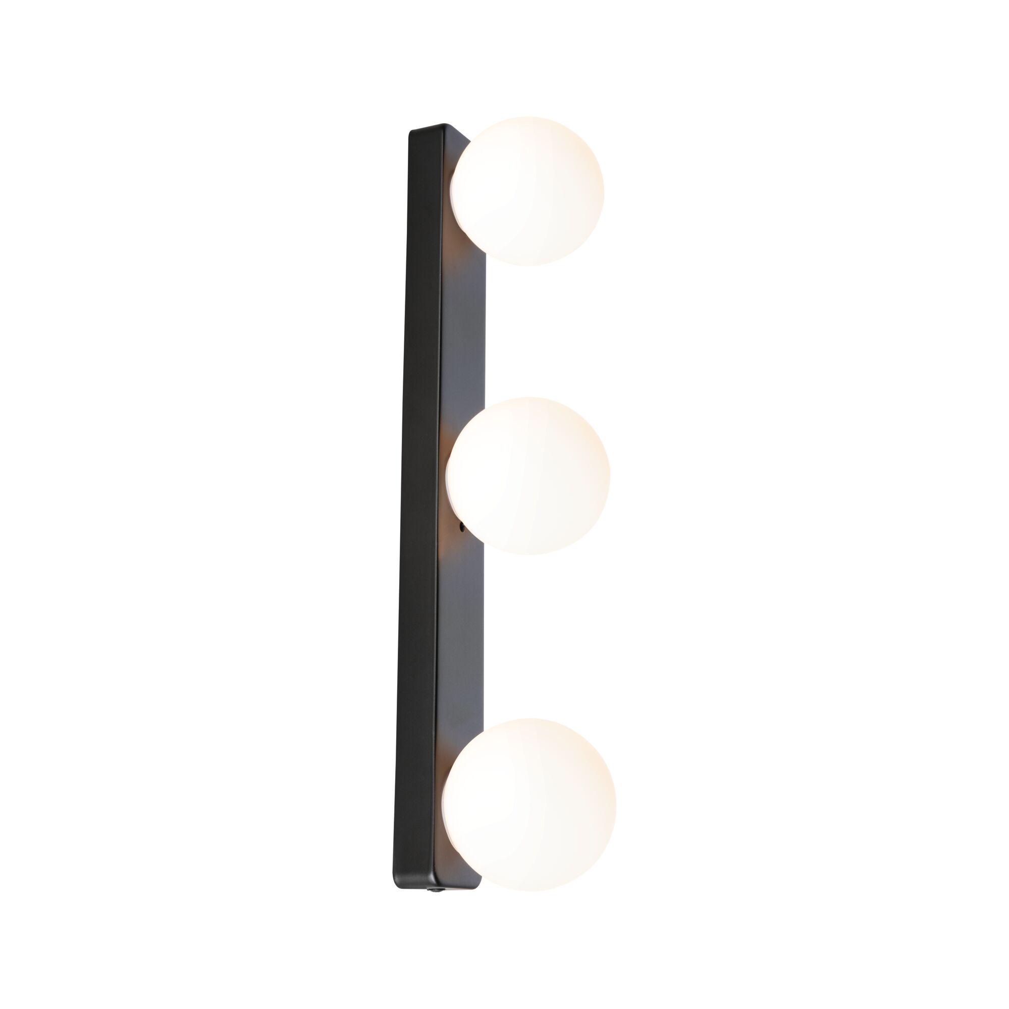 Modern wall light with three white glass globes and black metal frame for living spaces