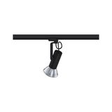 Schwarzer LED-Strahler mit silberner Reflektorlinse an Schienensystem für flexible Beleuchtung